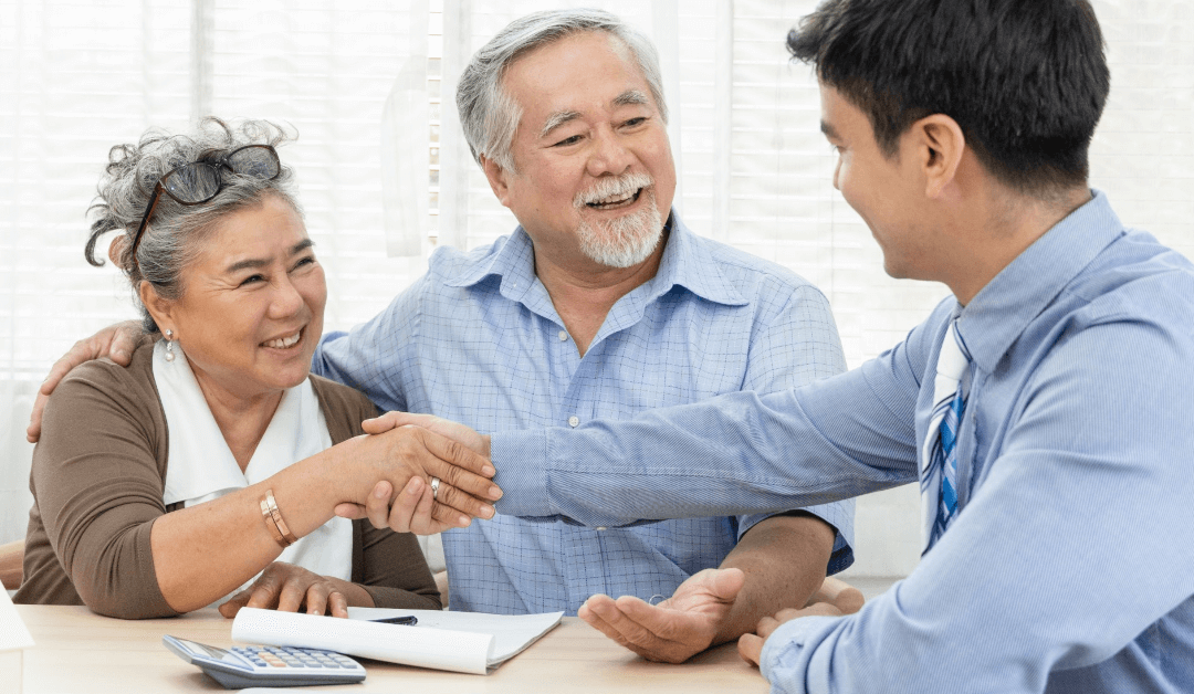 happy smiling asian old couple making-purchase and mature-woman handshake with real estate agent | Medicare Insurance | retirement plans in Palm Beach County | FMO insurance