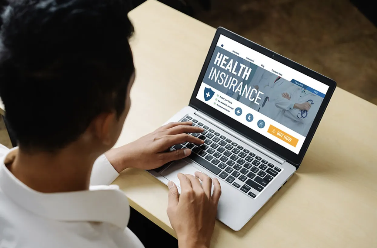 Man Working On Laptop | PPO Insurance in Port St. Lucie